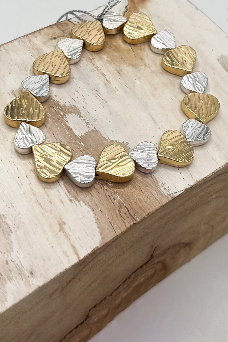 silver and gold textured heart bracelet